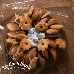 Assorted platter of cookies and empanadas