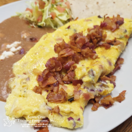 Three egg omelette with bacon, beans and tortillas